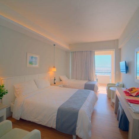 Elea Beach Room with double bed and a single bed view