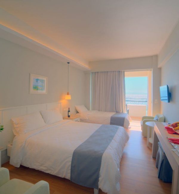 Elea Beach Room with double bed and a single bed view